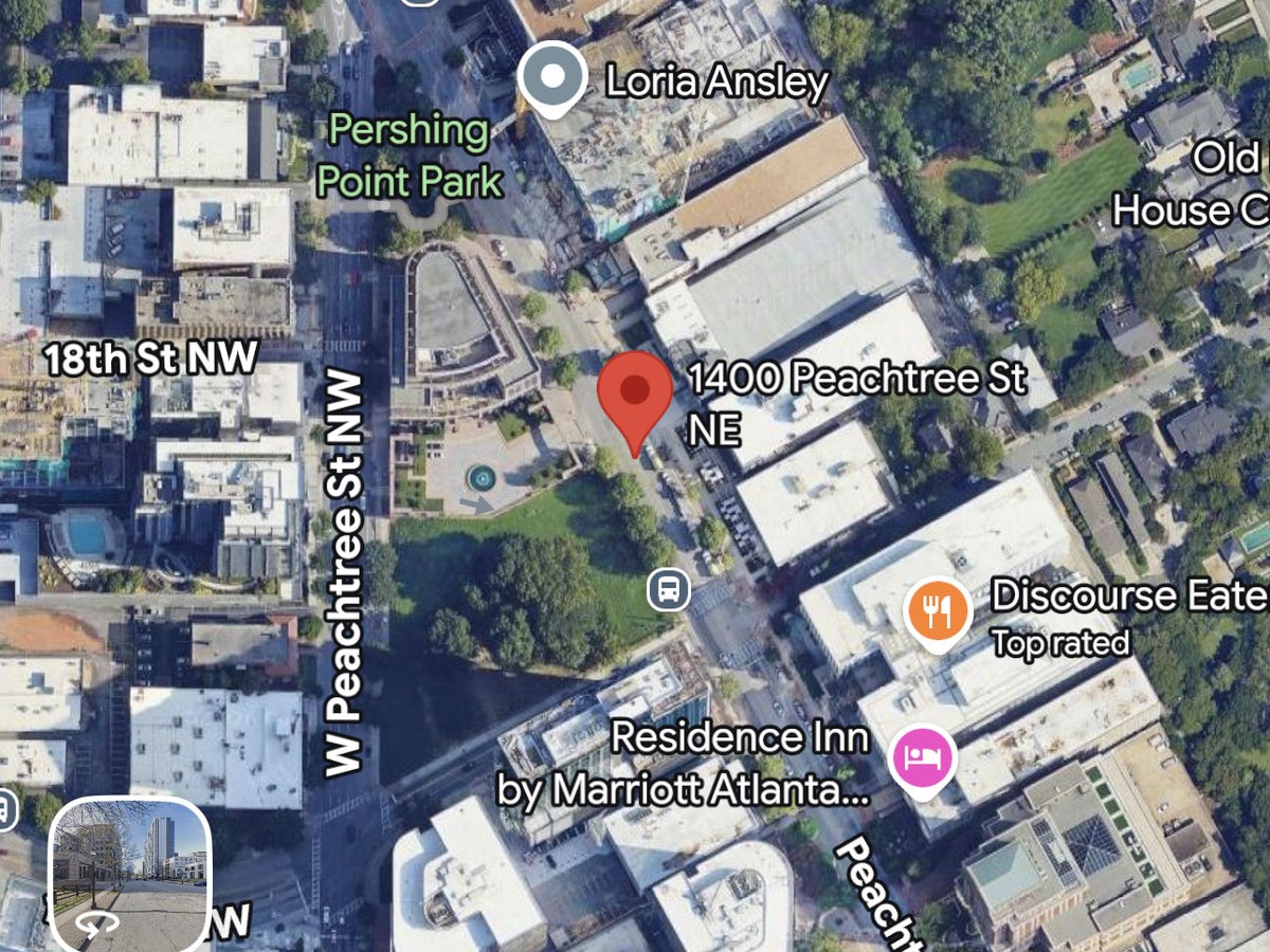 A map app opened on 1400 Peachtree St NE in Atlanta, with a dropped pin on the spa.
